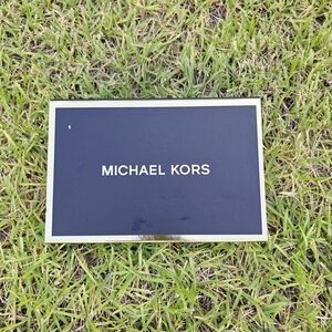 Michael Kors Black and White Display Sign